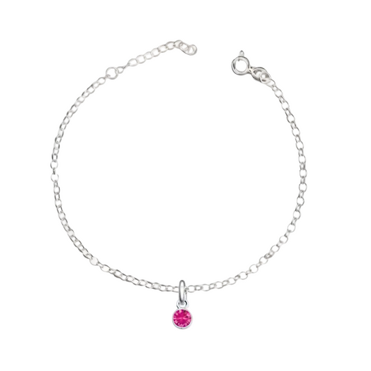 Silver bracelet with a pink gemstone charm on a white background