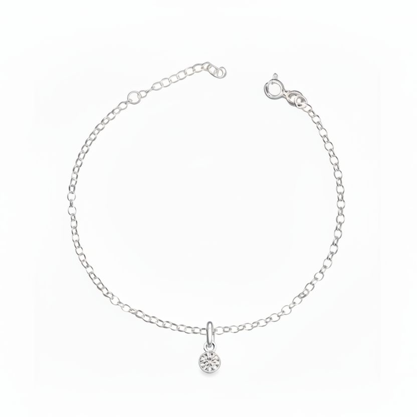 Silver bracelet with a small round pendant on a white background