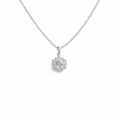 Silver flower necklace with diamond-studded pendant on a white background