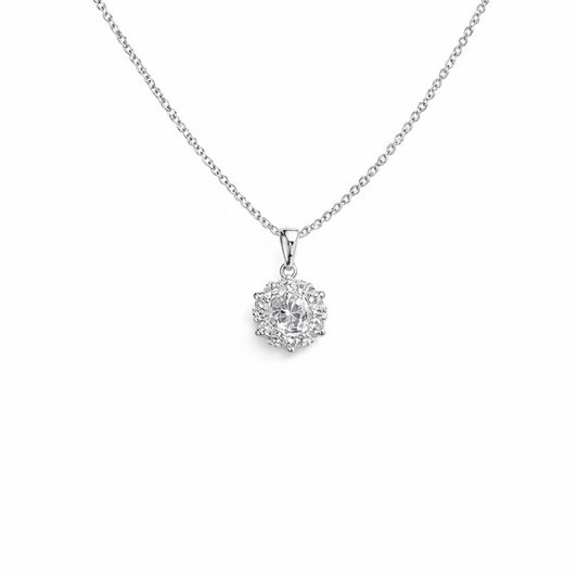 Silver flower necklace with diamond-studded pendant on a white background