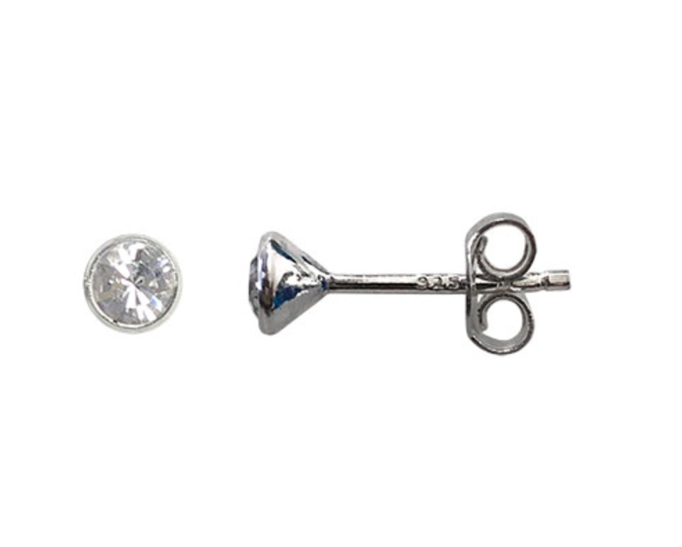 Silver earring with clear gemstone on a white background