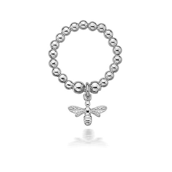 Silver beaded ring with a bee charm on a white background