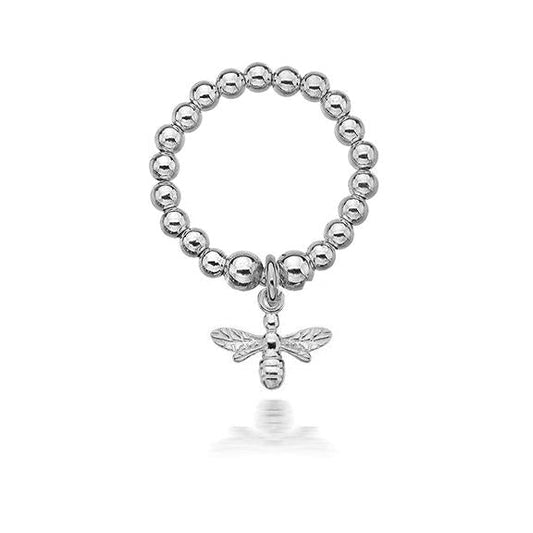Silver beaded ring with a bee charm on a white background