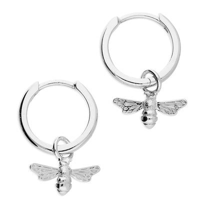 Silver hoop earrings with bee charms on a white background