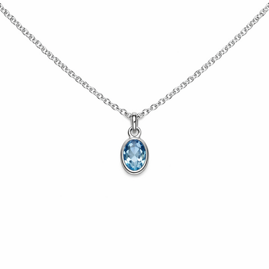 Sterling silver blue topaz necklace on a white background 