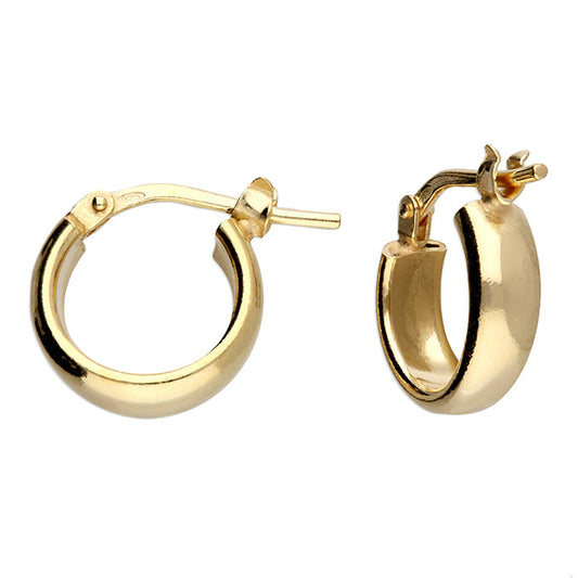 Gold hoop earrings on a white background