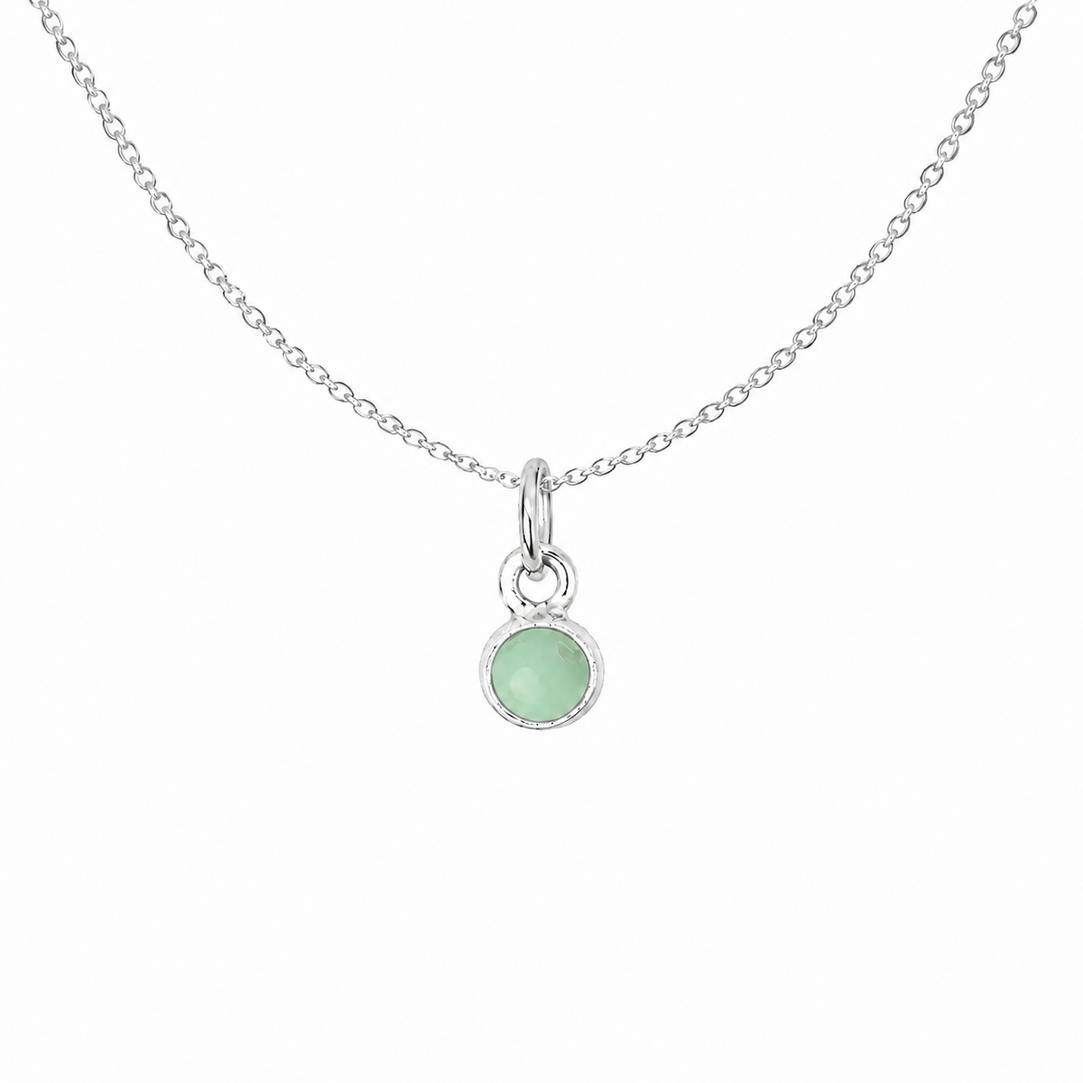 A delicate sterling silver chain necklace featuring a small circular bezel-set light green gemstone pendant, shown against a plain white background.
