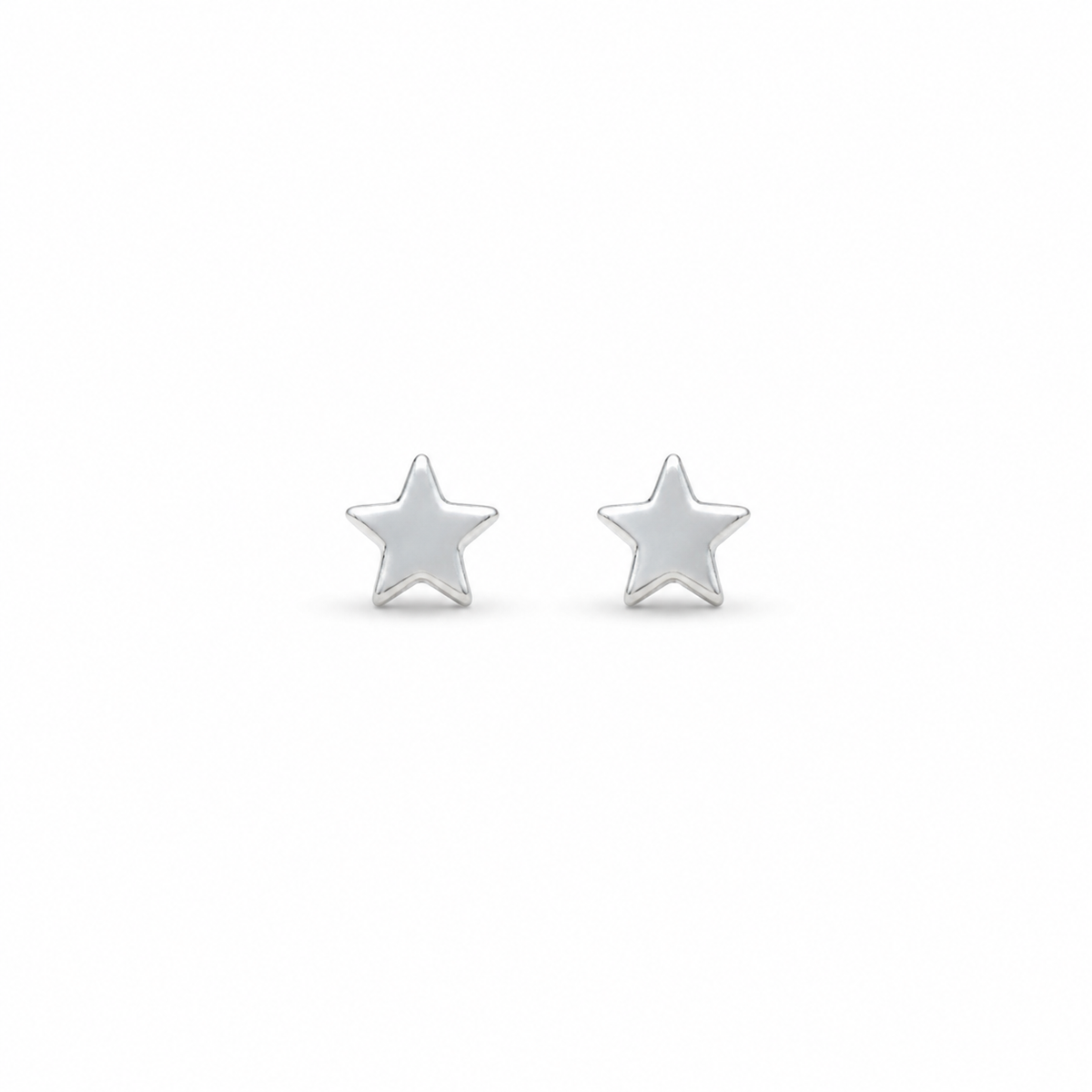 A pair of small silver star stud earrings on a plain white background.