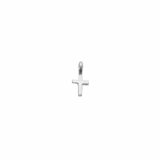 Silver cross pendant on a white background