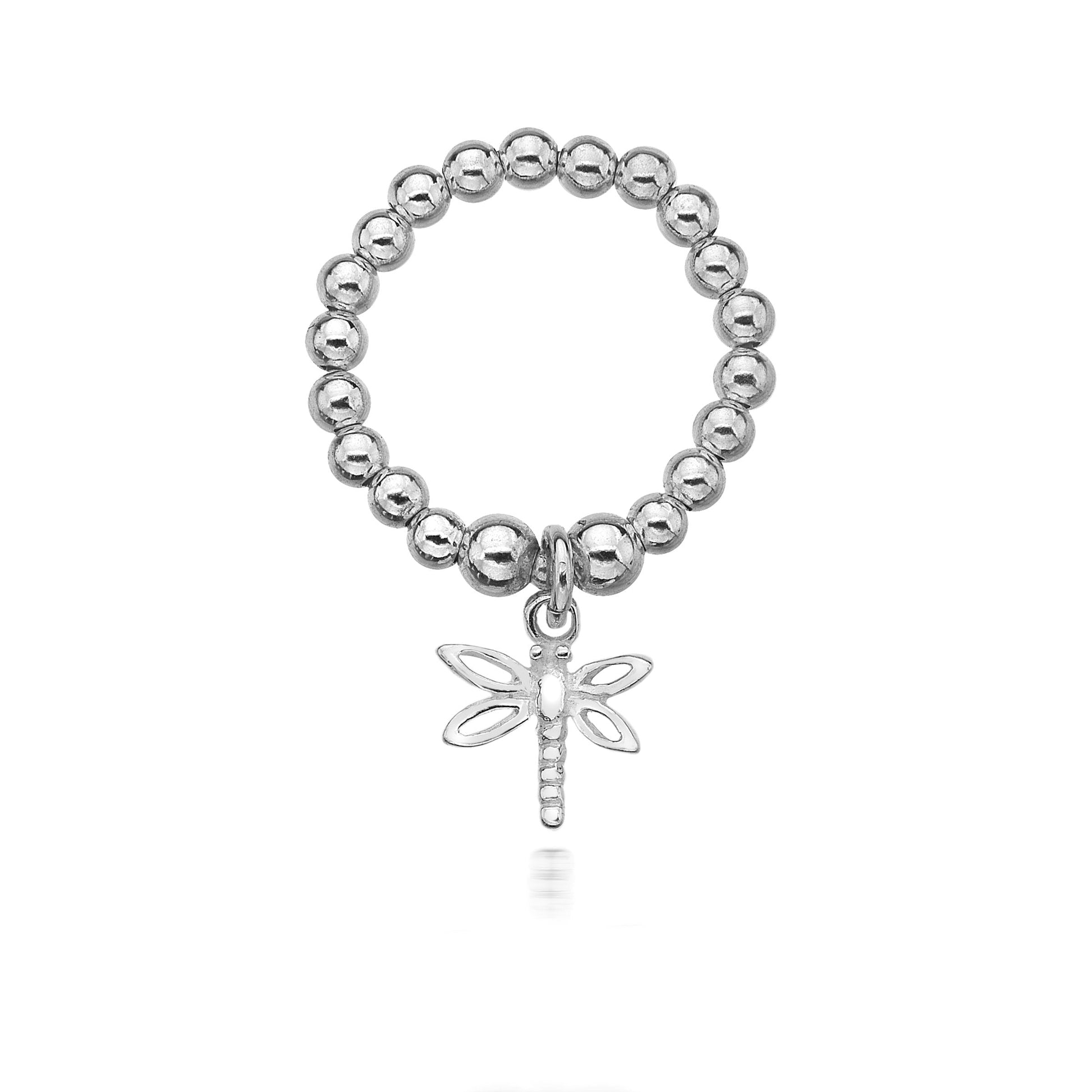 Silver beaded ring with a dragonfly charm on a white background
