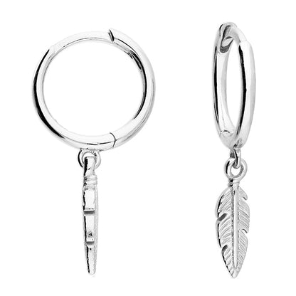 Silver hoop earrings with feather charms on a white background