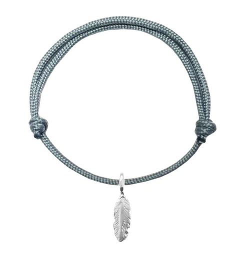 An adjustable bracelet made of rope with a silver-colored feather attached to it.