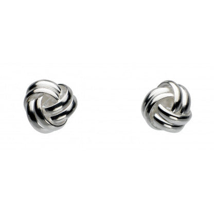 Pair of silver knot earrings on a white background
