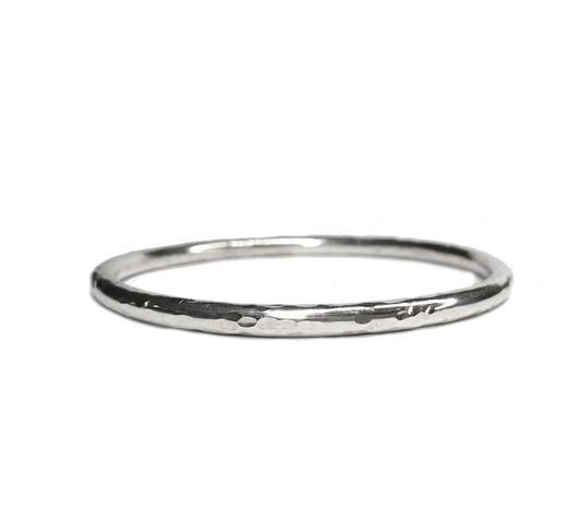 Silver bangle on a white background