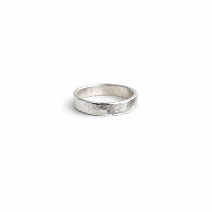 Silver ring on a white background