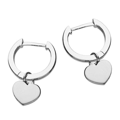 Silver hoop earrings with heart charms on a white background