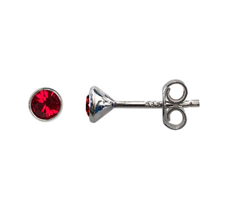 Ruby red gemstone earring on a white background 