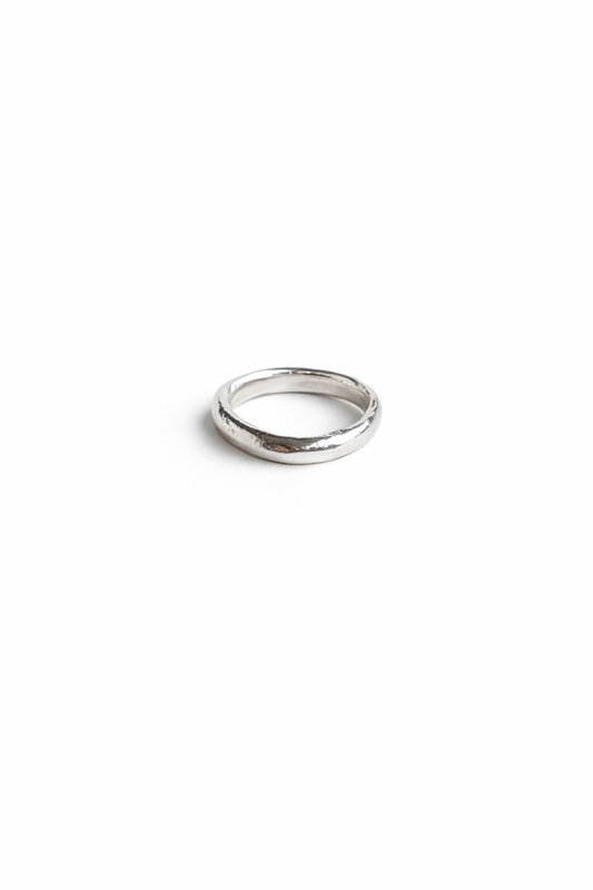 Silver ring on a white background