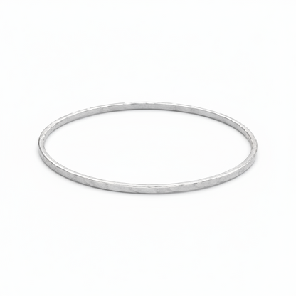 Silver bangle on a white background
