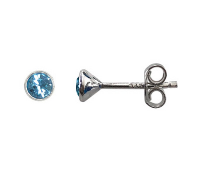Silver earring with blue gemstone on a white background