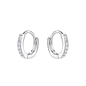 Pair of silver hoop earrings with sparkle gemstones on a white background
