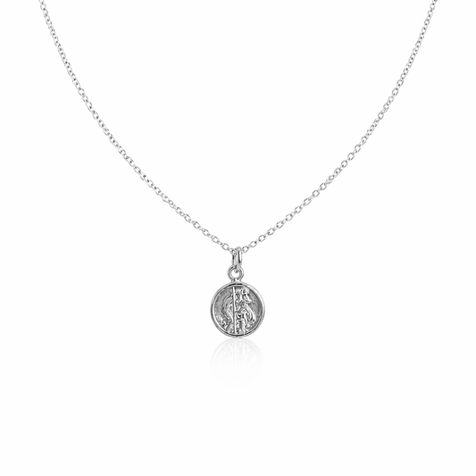 Silver necklace with a round st Christopher pendant on a white background