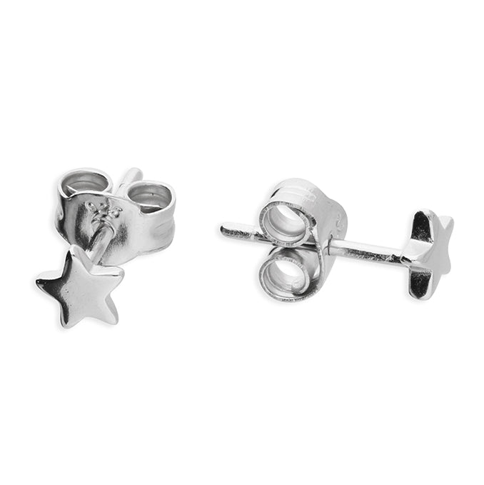 Silver star-shaped earrings on a white background
