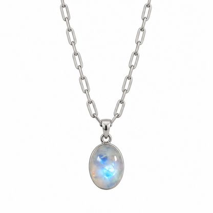A silver teeny trace necklace with an oval pendant featuring a white iridescent moonstone gemstone set against a plain white background