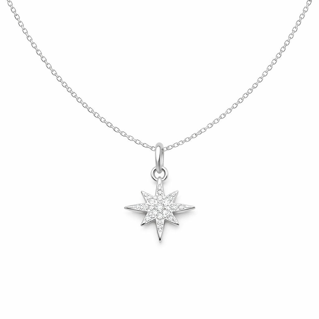 North Star diamond pendant on a chain against a white background