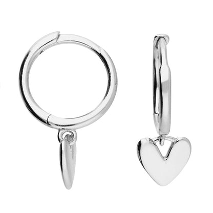 Silver hoop earrings with heart charms on a white background