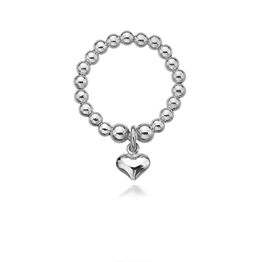 Silver beaded ring with a heart charm on a white background