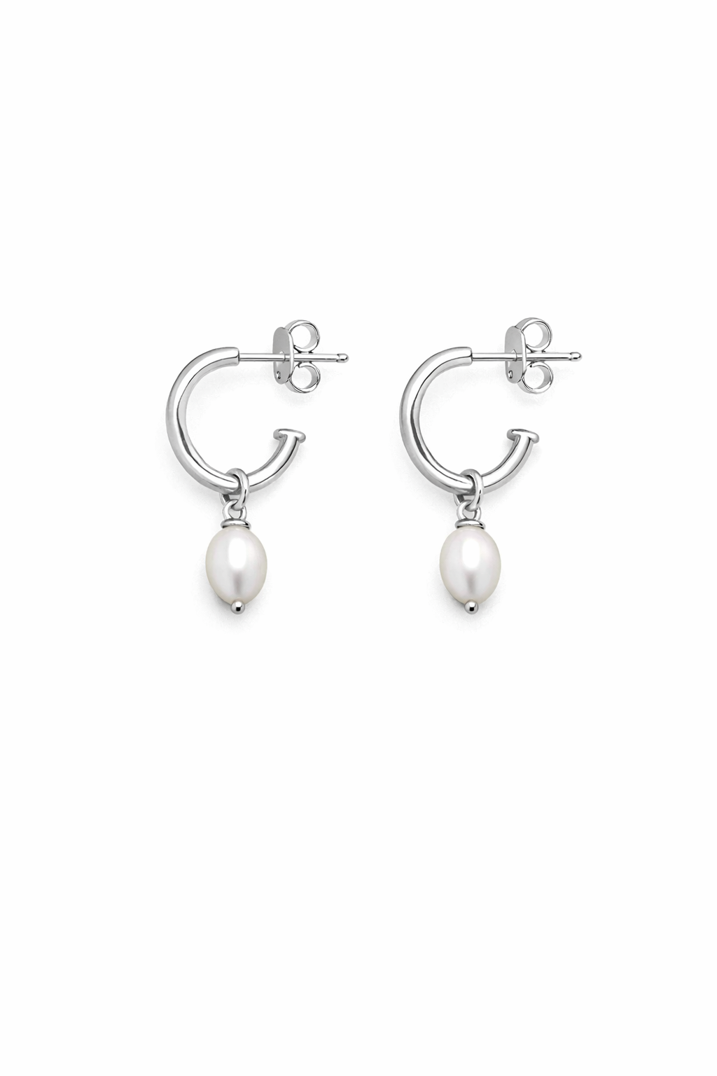 Pair of silver hoop earrings with pearl drops on a white background