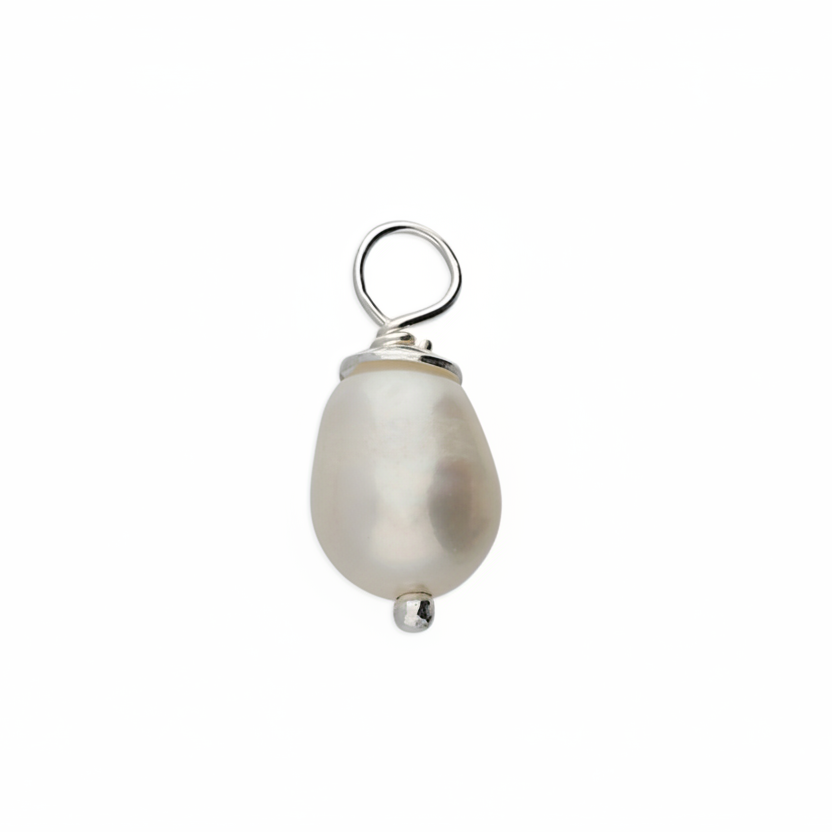 Pearl pendant with silver setting on a white background