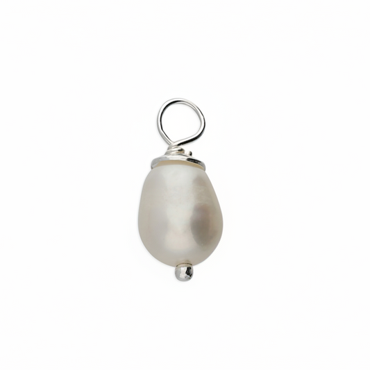 Pearl pendant with silver setting on a white background