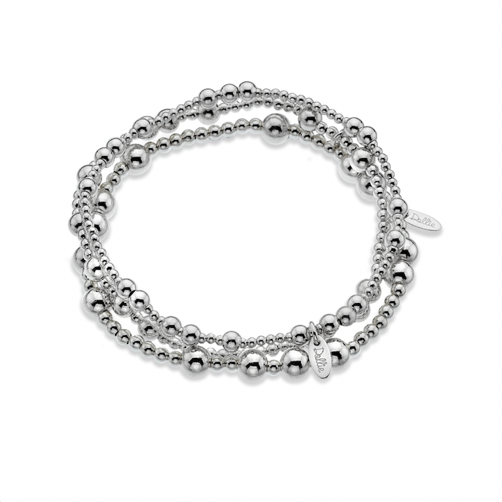 Three Silver beaded bracelet stack on a white background