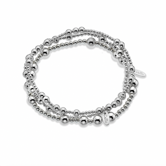Three Silver beaded bracelet stack on a white background