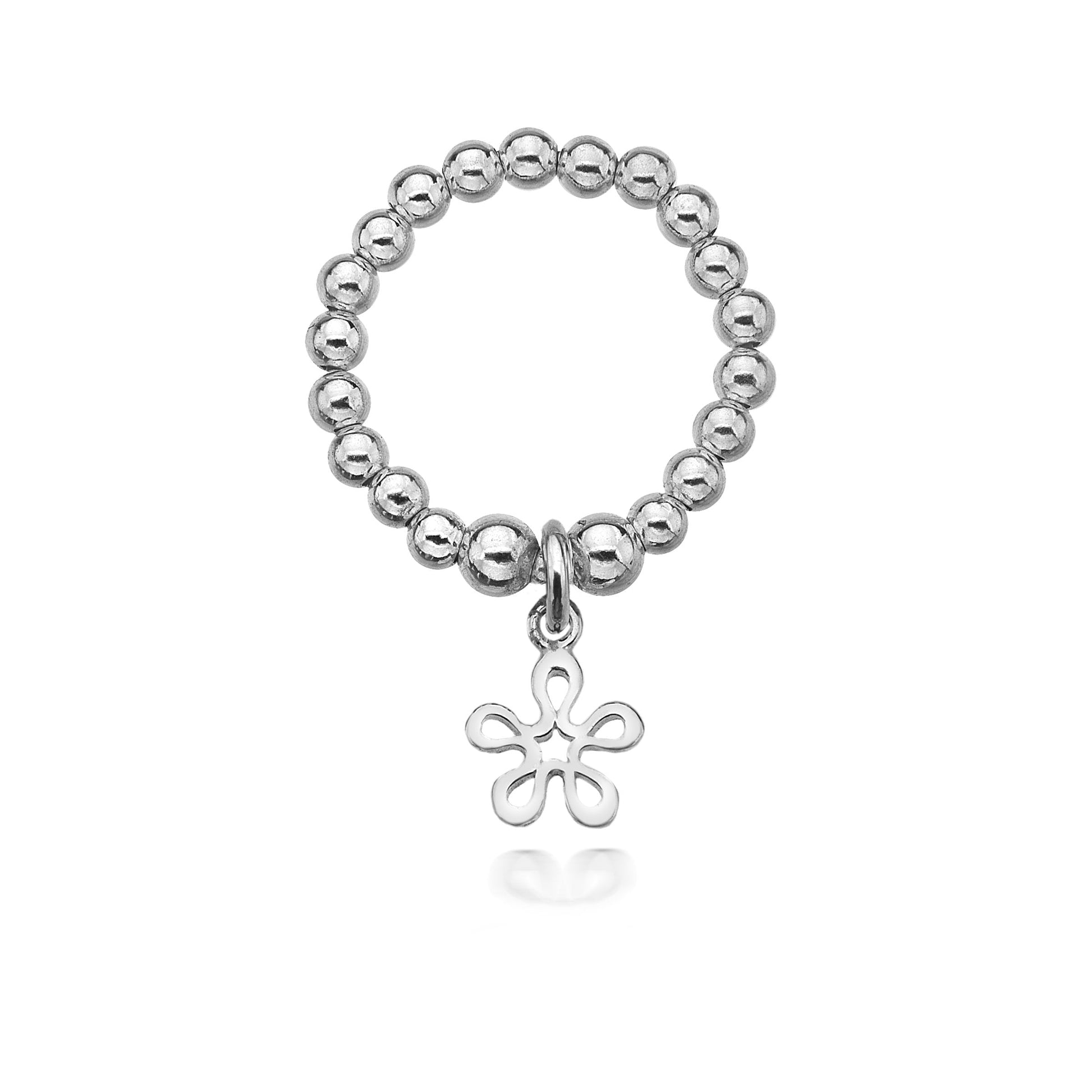 Silver beaded ring with a floral charm on a white background