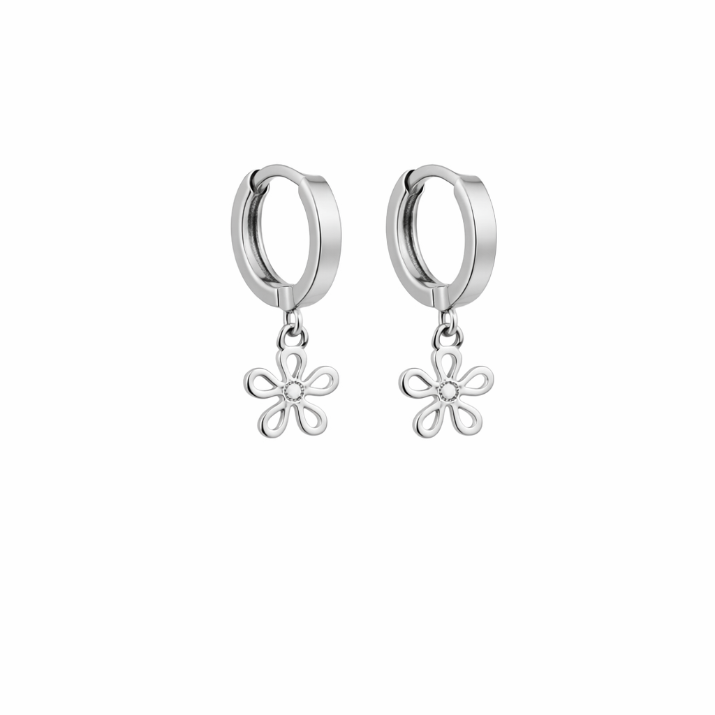 Silver hoop earrings with floral charms on a white background