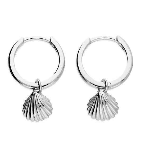 Pair of silver hoop earrings with shell charms on a white background