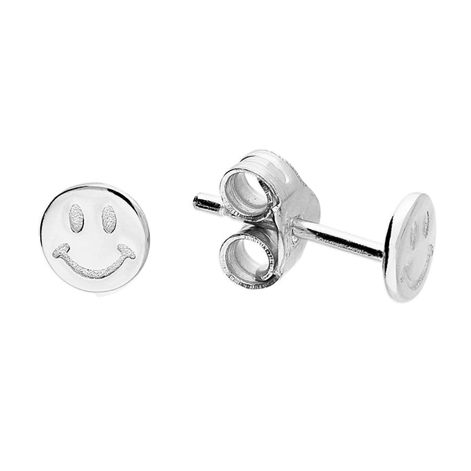 Silver smiley face earrings on a white background