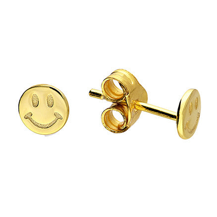 Gold smiley face earrings on a white background