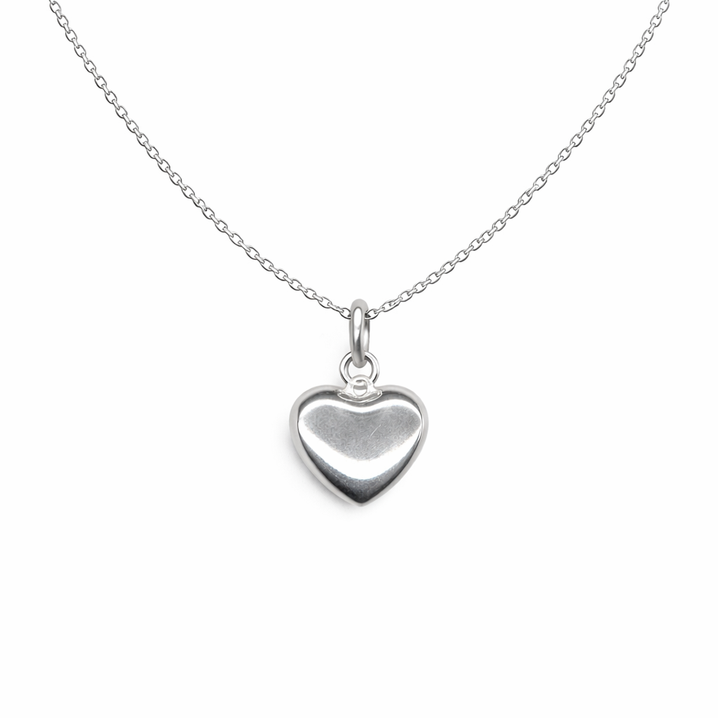 Silver heart-shaped pendant on a chain against a white background