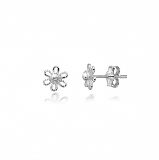 Silver flower-shaped earrings on a white background