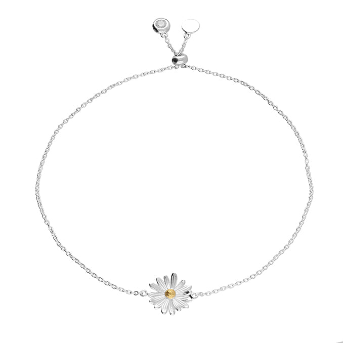 Silver bracelet with a daisy charm on a white background