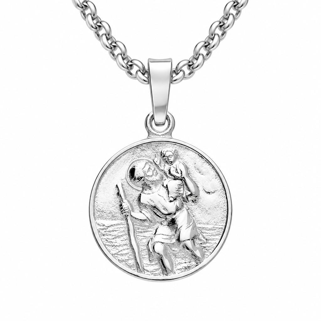 A silver round medallion pendant necklace featuring a detailed relief of Saint Christopher carrying the Christ child across water, suspended from a classic curb chain against a plain white background.