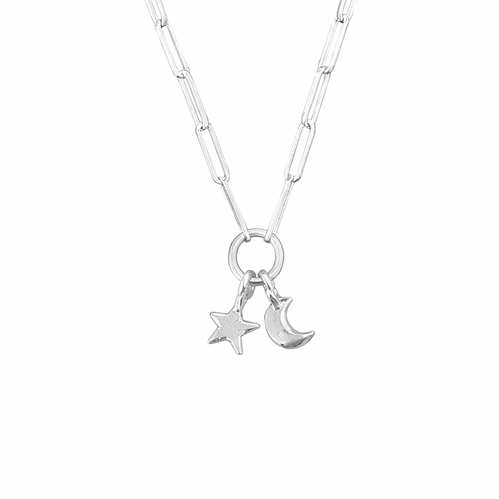 Star&moon trace necklace on white background 