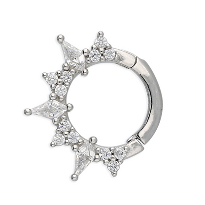 A silver earring with clear gemstone accents, photographed on a solid white background.