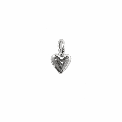 Silver heart-shaped pendant on a white background