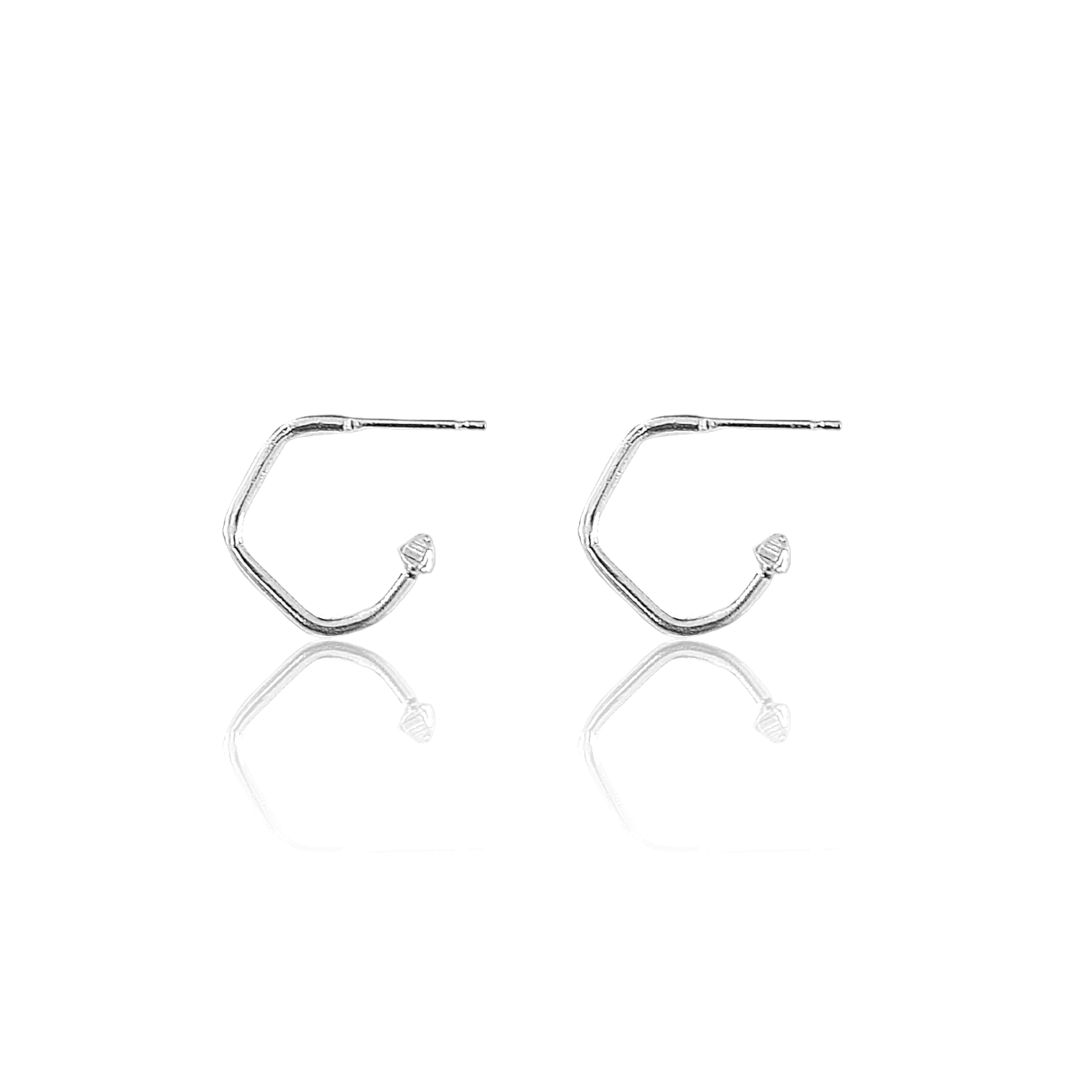 Handmade hoops with charms available on white background 