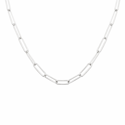 Silver trace chain necklace on a white background